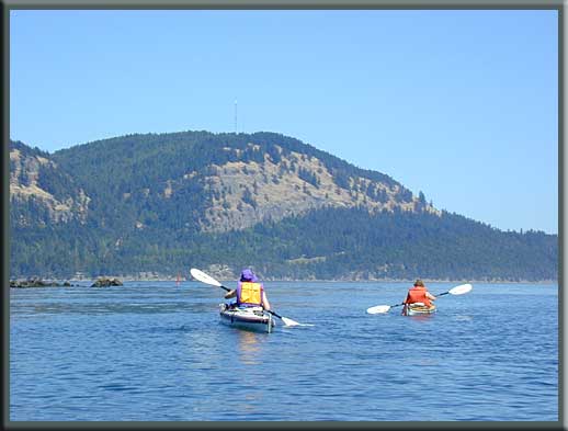 Saturna Island - Kayaking in front of Saturna Island's southern cliffs